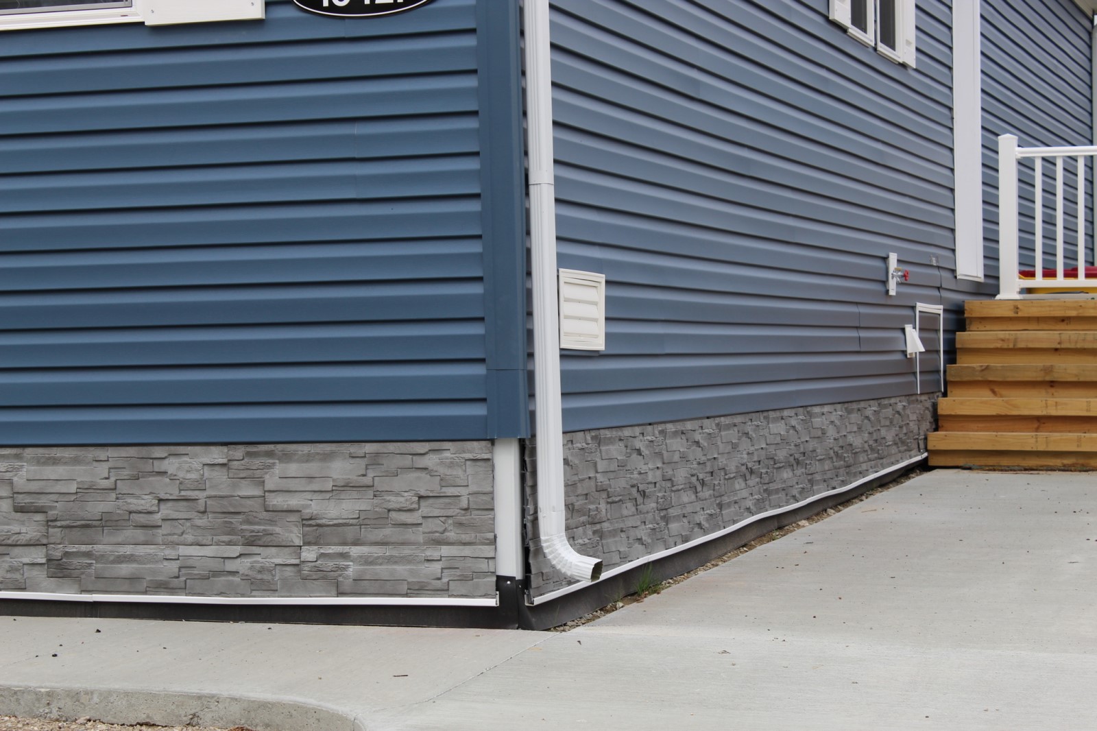 Novik exterior siding as skirting around a foundation