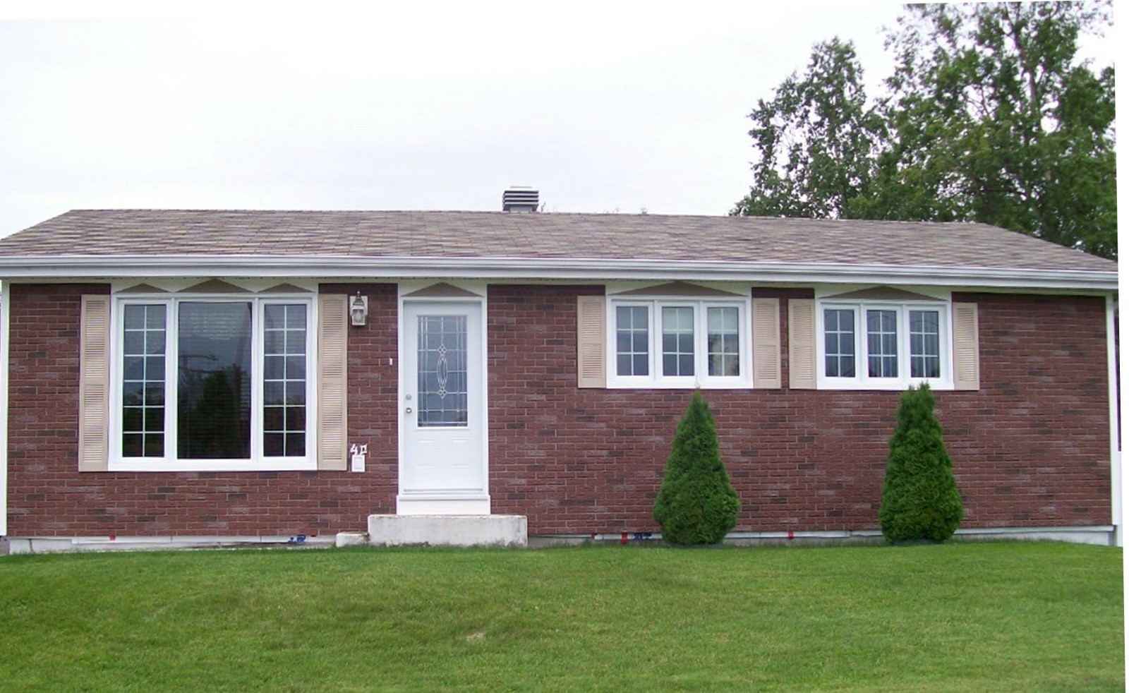 faux brick panels installed on the exterior of a home